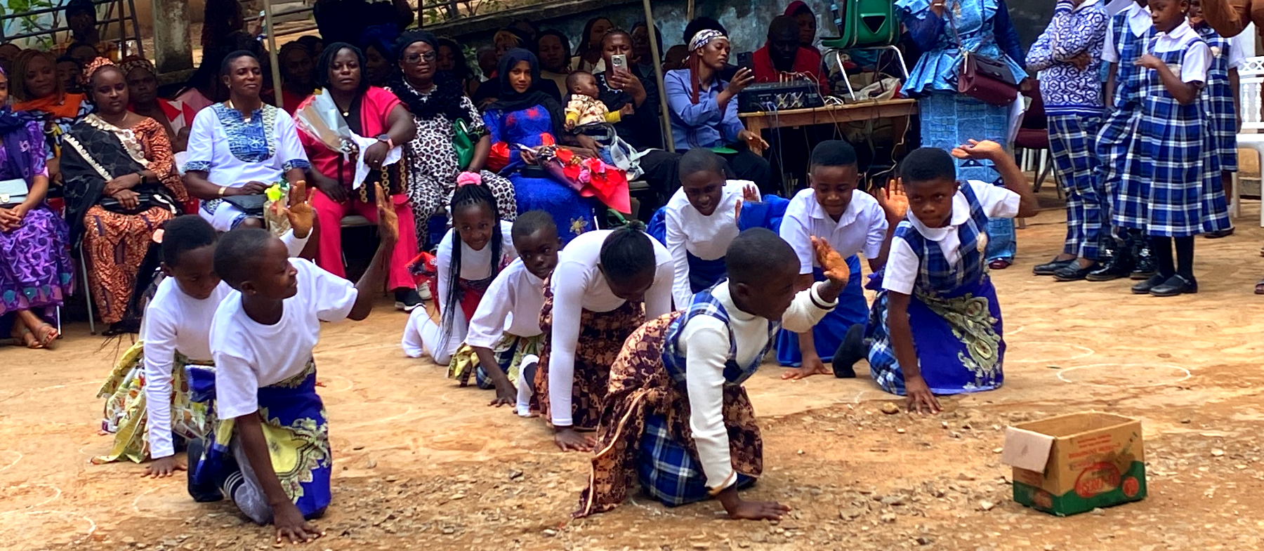 Pupils performing for parents
